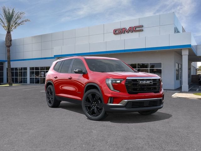 2026 GMC Acadia Elevation in Volcanic Red Tintcoat — front three-quarter view