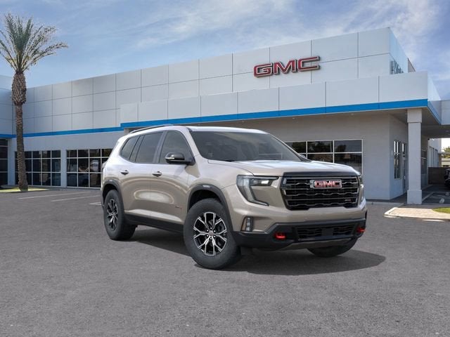 2026 GMC Acadia AT4 in Riverstone Metallic — front three-quarter view