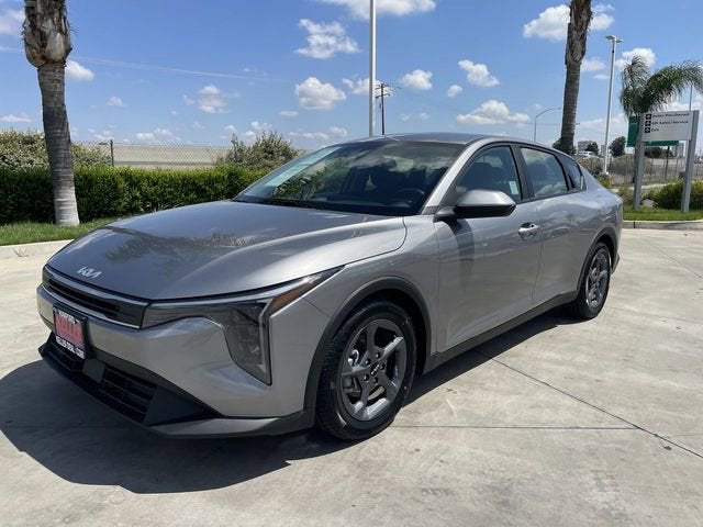 2025 Kia K4 LXS in Silver — front three-quarter view