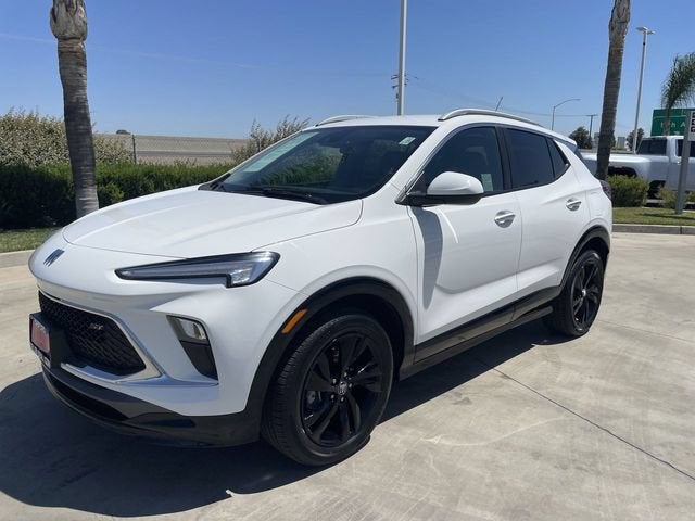 2024 Buick Encore GX Sport Touring in Summit White — front three-quarter view